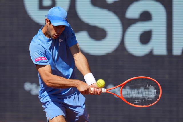 Portugal's Nuno Borges hits a return against Serbia's Hamad Medjedovic during the ATP Barcelona Open "Conde de Godo" tennis tournament tennis match at the Real Club de Tenis in Barcelona, on April 17, 2026. (Photo by Manaure QUINTERO / AFP)