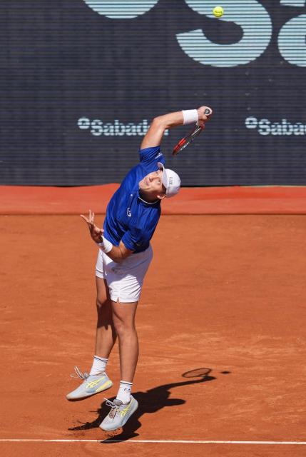 Serbia's Hamad Medjedovic serves to Portugal's Nuno Borges during the ATP Barcelona Open "Conde de Godo" tennis tournament tennis match at the Real Club de Tenis in Barcelona, on April 17, 2026. (Photo by Manaure QUINTERO / AFP)