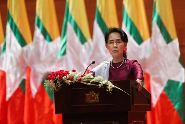 (FILES) Myanmar's State Counsellor Aung San Suu Kyi delivers a national address in Naypyidaw on September 19, 2017. Myanmar's coup-ousted and detained democratic leader Aung San Suu Kyi had her sentence reduced as part of a mass amnesty on April 17, 2026, a source close to her legal case told AFP. (Photo by YE AUNG THU / AFP)