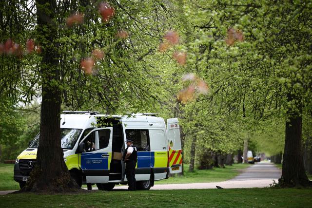 Officers stand by a Police van inside the closed Kensington Palace Gardens, west London on April 17, 2026, close to the Israeli Embassy. (Photo by Henry NICHOLLS / AFP)