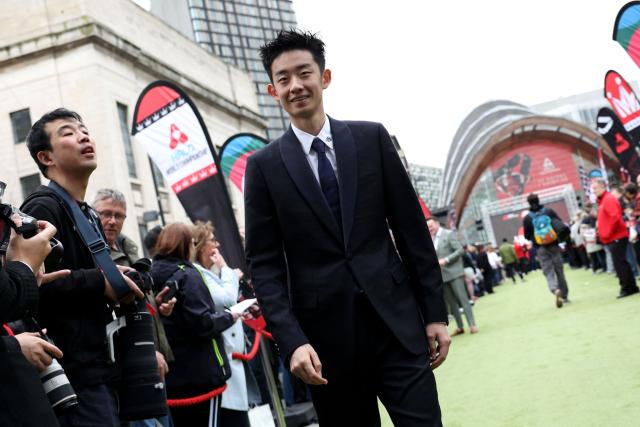 Chinese snooker player Wu Yize arrives to attend a media day launching the start of the World Snooker Championship 2026 at Crucible Theatre in Sheffield, northern England, on April 17, 2026. (Photo by Darren Staples / AFP)