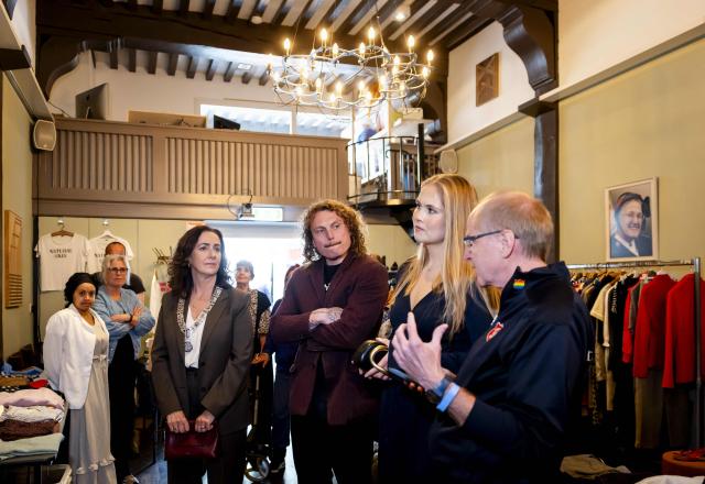 Princess Amalia of the Netherlands (2ndR) visits the Salvation Army on Warmoesstraat during the Warmoes Biennial in Amsterdam on April 17, 2026. The visit was part of a two-day official tour of Amsterdam during which the princess met residents and representatives from the science, sport, culture, housing and social sectors. (Photo by Koen van Weel / ANP / AFP) / Netherlands OUT