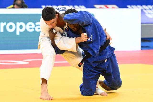 France's Dayyan Boulemtafes (white) and France's Joan-Benjamin Gaba compete in the men's under 73 kg category bronze medal bout at the Judo European Senior Championships 2026 in Tbilisi on April 17, 2026. (Photo by Vano SHLAMOV / AFP)