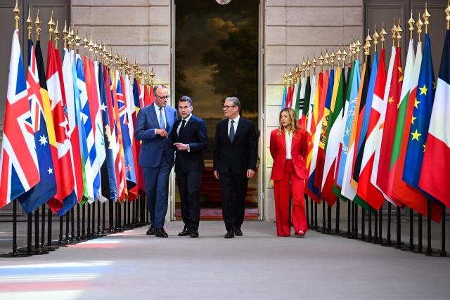(From L) Germany's Chancellor Friedrich Merz, France's President Emmanuel Macron, Britain's Prime Minister Keir Starmer and Italy's Prime Minister Giorgia Meloni arrive for an international summit on efforts to reopen the Strait of Hormuz at the Elysee Presidential Palace in Paris on April 17, 2026. French President Emmanuel Macron and UK Prime Minister Keir Starmer chair a meeting of allies to consider sending a multinational force to ensure security and free-flowing trade in the Strait of Hormuz once the current conflict between Iran and the US and Israel ends. Iran imposed the blockade on the critical shipping bottleneck as soon as the US and Israel launched the war against the Islamic republic on February 28, leading to a surge in global energy prices. Even with a shaky ceasefire in place, the US is now imposing its own blockade on Iranian ports. (Photo by Tom NICHOLSON / POOL / AFP)