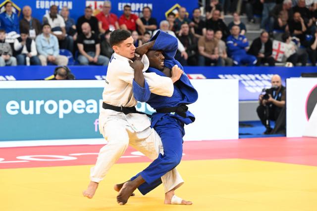 France's Dayyan Boulemtafes (white) and France's Joan-Benjamin Gaba compete in the men's under 73 kg category bronze medal bout at the Judo European Senior Championships 2026 in Tbilisi on April 17, 2026. (Photo by Vano SHLAMOV / AFP)