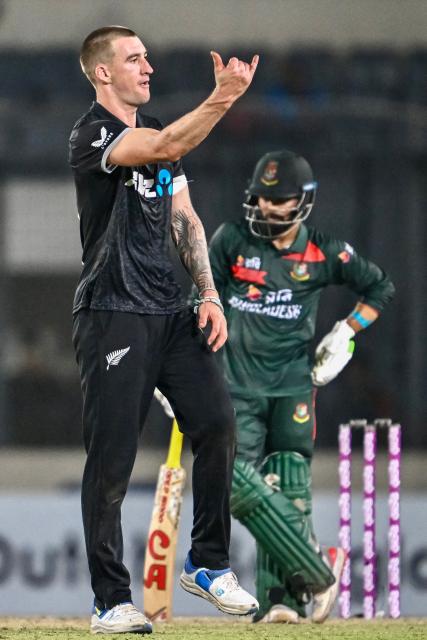 New Zealand's Blair Tickner celebrates after taking the wicket of Bangladesh's Shoriful Islam during the first one-day international (ODI) cricket match between Bangladesh and New Zealand at Sher-e-Bangla National Stadium in Mirpur on April 17, 2026. (Photo by Munir UZ ZAMAN / AFP)