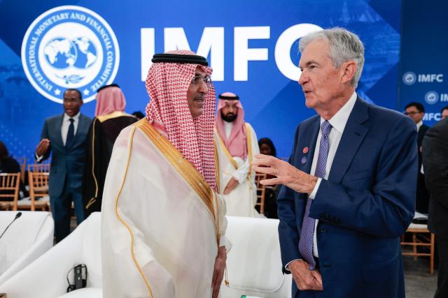 (L/R) Saudi Arabia's Finance Minister Mohammed Al-Jadaan speaks with US Federal Reserve Chair Jerome Powell during a meeting of the IMFC (International Monetary and Financial Committee) at the 2026 IMF and World Bank Group Spring Meetings in Washington, DC, on April 17, 2026. (Photo by Kent NISHIMURA / AFP)