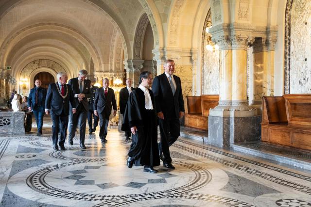 King Willem-Alexander of the Netherlands (C,R) speaks with International Court of Justice (ICJ) President Yuji Iwasawa (C) ahead of an ICJ celebratory session marking the 80th anniversary of the ICJ in The Hague on April 17, 2026. (Photo by Lina Selg / ANP / AFP) / Netherlands OUT