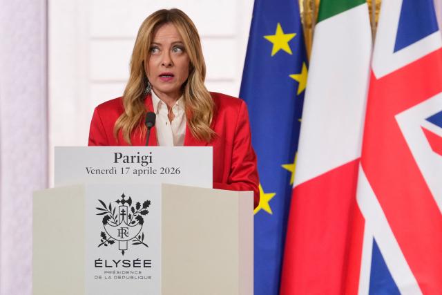 Italian Premier Giorgia Meloni delivers a statement following an international summit on efforts to reopen the Strait of Hormuz at the Elysee Palace in Paris on April 17, 2026. French President Emmanuel Macron and UK Prime Minister Keir Starmer chair a meeting of allies to consider sending a multinational force to ensure security and free-flowing trade in the Strait of Hormuz once the current conflict between Iran and the US and Israel ends. Iran imposed the blockade on the critical shipping bottleneck as soon as the US and Israel launched the war against the Islamic republic on February 28, leading to a surge in global energy prices. Even with a shaky ceasefire in place, the US is now imposing its own blockade on Iranian ports. (Photo by Michel Euler / POOL / AFP)