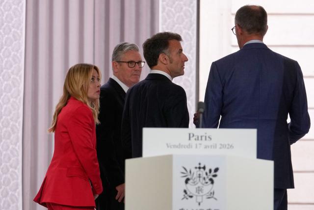 (LtoR) Italian Prime Minister Giorgia Meloni, British Prime Minister Keir Starmer, French President Emmanuel Macron and German Chancellor Friedrich Merz leave following a joint statement at the end of an international summit on efforts to reopen the Strait of Hormuz at the Elysee Palace in Paris on April 17, 2026. French President Emmanuel Macron and UK Prime Minister Keir Starmer chair a meeting of allies to consider sending a multinational force to ensure security and free-flowing trade in the Strait of Hormuz once the current conflict between Iran and the US and Israel ends. Iran imposed the blockade on the critical shipping bottleneck as soon as the US and Israel launched the war against the Islamic republic on February 28, leading to a surge in global energy prices. Even with a shaky ceasefire in place, the US is now imposing its own blockade on Iranian ports. (Photo by Michel Euler / POOL / AFP)