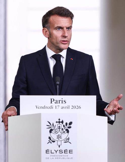 France's President Emmanuel Macron gestures as he speaks during a joint press conference following an international summit on efforts to reopen the Strait of Hormuz at the Elysee Presidential Palace in Paris on April 17, 2026. French President Emmanuel Macron and UK Prime Minister Keir Starmer chair a meeting of allies to consider sending a multinational force to ensure security and free-flowing trade in the Strait of Hormuz once the current conflict between Iran and the US and Israel ends. Iran imposed the blockade on the critical shipping bottleneck as soon as the US and Israel launched the war against the Islamic republic on February 28, leading to a surge in global energy prices. Even with a shaky ceasefire in place, the US is now imposing its own blockade on Iranian ports. (Photo by Tom Nicholson / POOL / AFP)