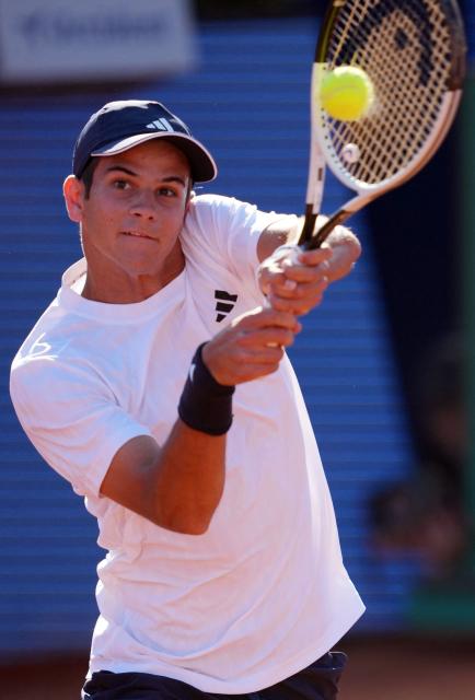 Spain's Rafael Jodar returns the ball against Britain's Cameron Norrie during their ATP Barcelona Open "Conde de Godo" tennis tournament quarterfinals singles tennis match at the Real Club de Tenis in Barcelona, on April 17, 2026. (Photo by Manaure Quintero / AFP)