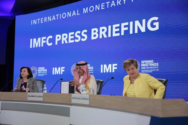 (L/R) IMF Communications Department Director Julie Kozack, Saudi Arabia's Finance Minister Mohammed Al-Jadaan and IMF Managing Director Kristalina Georgieva speak during a press briefing following a meeting of the IMFC (International Monetary and Financial Committee) at the 2026 IMF and World Bank Group Spring Meetings in Washington, DC, on April 17, 2026. (Photo by Kent NISHIMURA / AFP)