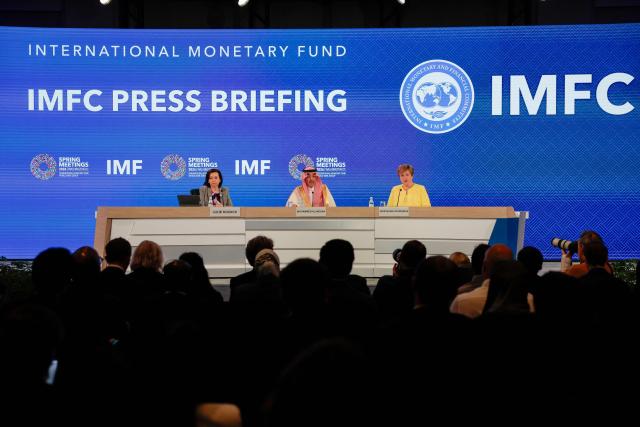 (L/R) IMF Communications Department Director Julie Kozack, Saudi Arabia's Finance Minister Mohammed Al-Jadaan and IMF Managing Director Kristalina Georgieva speak during a press briefing following a meeting of the IMFC (International Monetary and Financial Committee) at the 2026 IMF and World Bank Group Spring Meetings in Washington, DC, on April 17, 2026. (Photo by Kent NISHIMURA / AFP)