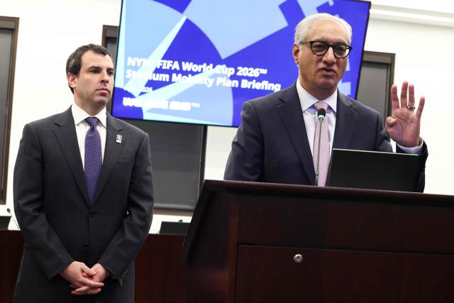 NJ Transit CEO Kris Kolluri (R) speaks alongside Alex Lasry (L), CEO of 2026 FIFA World Cup New York New Jersey Host Committee, during a press briefing on the New York/New Jersey FIFA World Cup 2026 regional mobility plan in Newark, New Jersey on April 17, 2026. (Photo by CHARLY TRIBALLEAU / AFP)