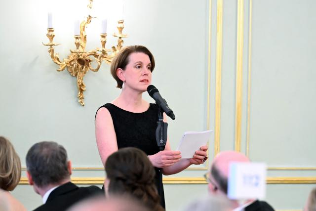 Melissa Eddy, correspondent for 'The New York Times' and Chair of the Association of the Foreign Press in Germany, delivers a speech during the Bundespresseball (German Federal Press Ball) in Berlin, Germany, on April 18, 2026. (Photo by Annette Riedl / dpa pool / AFP)