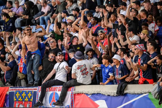 Paris Saint-Germain's supporters react during the UEFA Youth League semi-final football match between Real Madrid and Paris Saint-Germain at Stade de la Tuiliere in Lausanne, on April 17, 2026. (Photo by Fabrice COFFRINI / AFP)