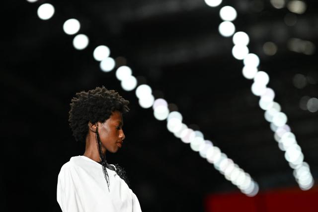 A model presents a creation by Angela Brito during Rio Fashion Week at Pier Maua in Rio de Janeiro, Brazil, on April 17, 2026. (Photo by Mauro PIMENTEL / AFP)