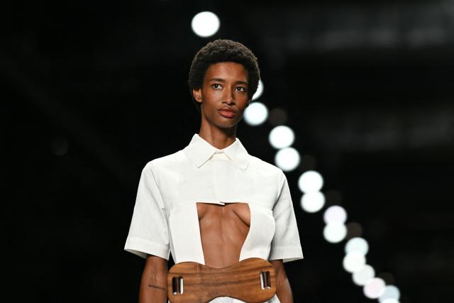 A model presents a creation by Angela Brito during Rio Fashion Week at Pier Maua in Rio de Janeiro, Brazil, on April 17, 2026. (Photo by Mauro PIMENTEL / AFP)