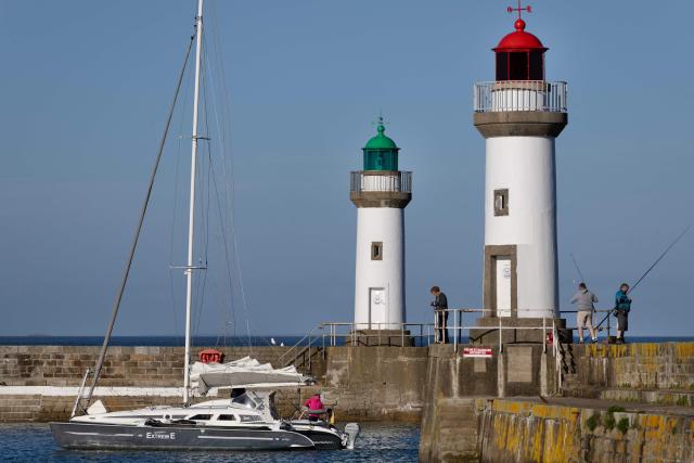 A boat enters the port of Le Palis in Belle-Ile-en-Mer, western France, on April 17, 2026. (Photo by Fred TANNEAU / AFP)