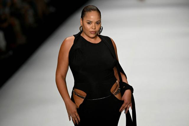 A model presents a creation by Karoline Vitto during Rio Fashion Week at Pier Maua in Rio de Janeiro, Brazil, on April 17, 2026. (Photo by Mauro PIMENTEL / AFP)