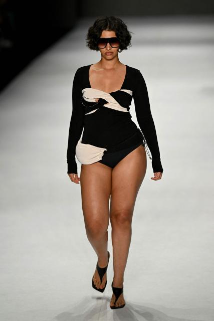 A model presents a creation by Karoline Vitto during Rio Fashion Week at Pier Maua in Rio de Janeiro, Brazil, on April 17, 2026. (Photo by Mauro PIMENTEL / AFP)