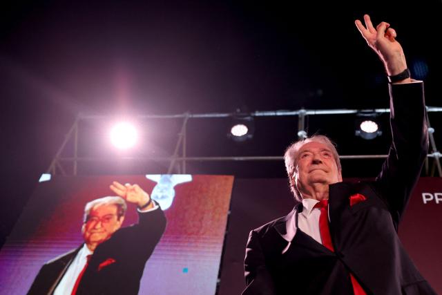 Albanian opposition leader Sali Berisha gestures as he greets his supporters in front of the Prime Minister office during an anti-government protest in Tirana on April 17, 2026. (Photo by Adnan Beci / AFP)