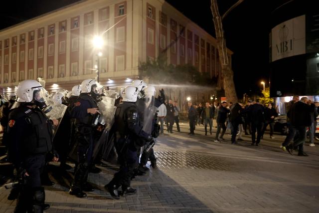 Protestors clash with Albanian riot police during an anti-government protest in Tirana on April 17, 2026. (Photo by Adnan Beci / AFP)