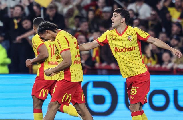 Lens' Burkinabe defender #37 Ismaelo Ganiou (L)  celebrates with Lens' Montenegrin midfielder #05 Andrija Bulatovic (R) after scoring a goal  during the French L1 football match between RC Lens and Toulouse FC at the Stade Bollaert-Delelis in Lens, northern France, on April 17, 2026. (Photo by Francois LO PRESTI / AFP)