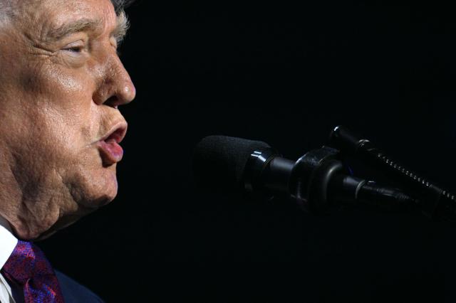 US President Donald Trump addresses a Turning Point USA event entitled "Build the Red Wall" at Dream City Church in Phoenix, Arizona, on April 17, 2026. (Photo by Jim WATSON / AFP)