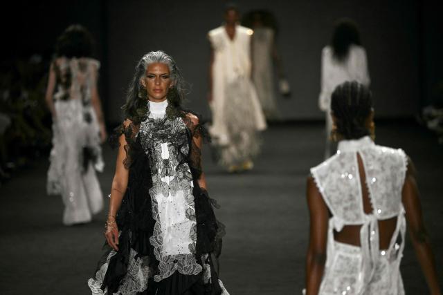 Models present creations by Apartamento 03 during Rio Fashion Week at Pier Maua in Rio de Janeiro, Brazil, on April 17, 2026. (Photo by Mauro PIMENTEL / AFP)