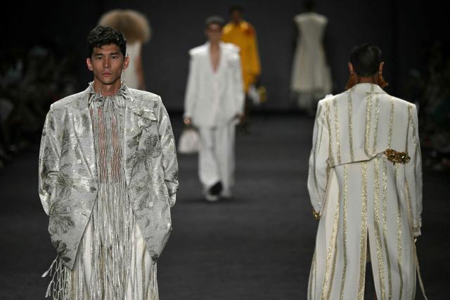 Models present creations by Apartamento 03 during Rio Fashion Week at Pier Maua in Rio de Janeiro, Brazil, on April 17, 2026. (Photo by Mauro PIMENTEL / AFP)