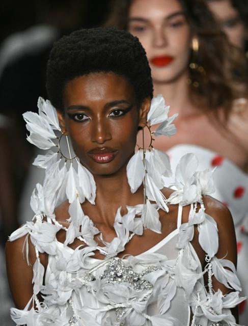 A model presents a creation by Apartamento 03 during Rio Fashion Week at Pier Maua in Rio de Janeiro, Brazil, on April 17, 2026. (Photo by Mauro PIMENTEL / AFP)