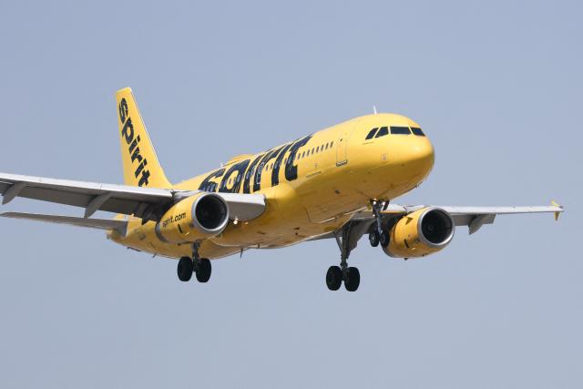 A Spirit Airlines Airbus A320 lands at Hollywood Burbank Airport on April 17, 2026. Spirit Airlines has been facing financial troubles, while rising jet fuel due to the war in Iran has amplified their worries. (Photo by Patrick T. Fallon / AFP)