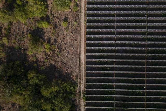 Aerial view of the solar park in Zona Bananera, Prado Sevilla, Magdalena department, Colombia on April 17, 2026. Co-organised by the governments of Colombia and the Netherlands, the first conference on the transition away from fossil fuels will be held in Santa Marta on April 28 and 29, 2026, with representatives of more than 50 countries attending. (Photo by Luis Acosta / AFP)
