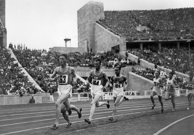 (FILES) Gunnar Hockert from Finland speeds ahead for the 5000 m event and wins gold during the Summer Olympic Games in Berlin 07 August 1936. On April 19, 2026, voters in Germany's Rhine/Ruhr region will be the latest to have their say on a possible bid to host the Summer Olympics in either 2036, 2040 or 2044.
Around four million voters in the former German industrial heartland are expected to cast their ballots, six months after a similar initiative was successfully put to a vote in Munich. (Photo by AFP)