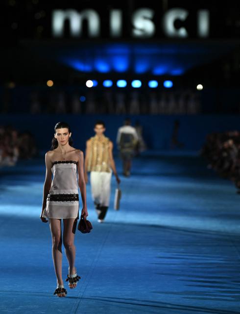 A model presents a creation by Misci during Rio Fashion Week at Marques de Sapucai sambadrome in Rio de Janeiro, Brazil on April 17, 2026. (Photo by Mauro PIMENTEL / AFP)