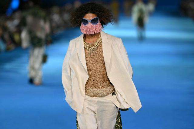 A model presents a creation by Misci during Rio Fashion Week at Marques de Sapucai sambadrome in Rio de Janeiro, Brazil on April 17, 2026. (Photo by Mauro PIMENTEL / AFP)