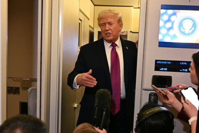 US President Donald Trump speaks to the press aboard Air Force One before arriving at Joint Base Andrews in Maryland on April 17, 2026 after a two-day trip to Nevada and Arizona. (Photo by Jim WATSON / AFP)