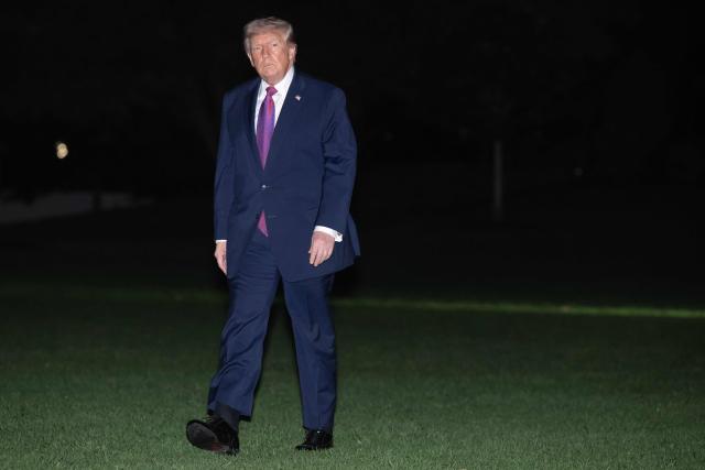US President Donald Trump walks on the South Lawn after arriving on Marine One at the White House in Washington, DC, April 17, 2026, following a trip to Nevada and Arizona. (Photo by SAUL LOEB / AFP)