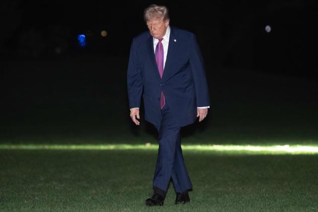 US President Donald Trump walks on the South Lawn after arriving on Marine One at the White House in Washington, DC, April 17, 2026, following a trip to Nevada and Arizona. (Photo by SAUL LOEB / AFP)