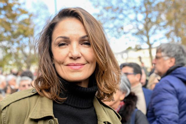 (FILES) French actress Nadia Fares poses for a photograph at the start of a “silent march” calling for peace in the Middle East, in Paris on November 19, 2023. Known in France and abroad since the 2000 film "The Crimson Rivers," actress Nadia Farиs, 57, who was found unconscious in a Paris swimming pool a week ago and has been in a coma since, died on April 17, 2026. (Photo by Bertrand GUAY / AFP)