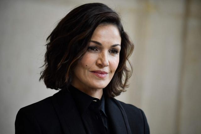 (FILES) French actress Nadia Fares poses during the Christian Dior photocall as part of the Haute-Couture Spring-Summer 2023 Fashion Week in Paris on January 23, 2023. Fares, who was found unconscious in a Paris swimming pool on April 11, died Friday at the age of 57. (Photo by JULIEN DE ROSA / AFP)