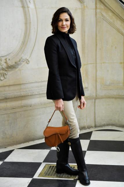 (FILES) French actress Nadia Fares poses during the Christian Dior photocall as part of the Haute-Couture Spring-Summer 2023 Fashion Week in Paris on January 23, 2023. Known in France and abroad since the 2000 film "The Crimson Rivers," actress Nadia Farès, 57, who was found unconscious in a Paris swimming pool a week ago and has been in a coma since, died on April 17, 2026. (Photo by JULIEN DE ROSA / AFP)