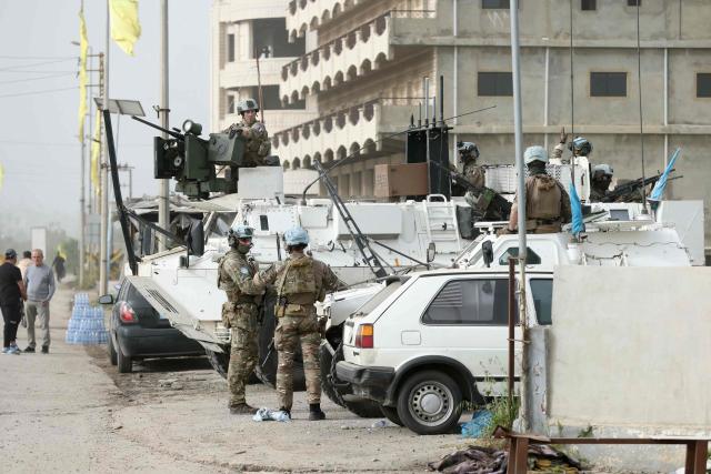 A French contingent of the United Nations Interim Force in Lebanon (UNIFIL) patrols the area as displaced residents make their way back to their homes in the southern Lebanese area of Al-Qasmiyeh on April 18, 2026. Israel and Lebanon agreed to a 10-day ceasefire on April 16 in order to negotiate an end to six weeks of war between Israel and the Iran-backed group Hezbollah. The conflict saw massive Israeli airstrikes across Lebanon and also a ground invasion in the south. (Photo by MAHMOUD ZAYYAT / AFP)