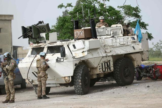 A French contingent of the United Nations Interim Force in Lebanon (UNIFIL) patrols the area as displaced residents make their way back to their homes in the southern Lebanese area of Al-Qasmiyeh on April 18, 2026. Israel and Lebanon agreed to a 10-day ceasefire on April 16 in order to negotiate an end to six weeks of war between Israel and the Iran-backed group Hezbollah. The conflict saw massive Israeli airstrikes across Lebanon and also a ground invasion in the south. (Photo by MAHMOUD ZAYYAT / AFP)