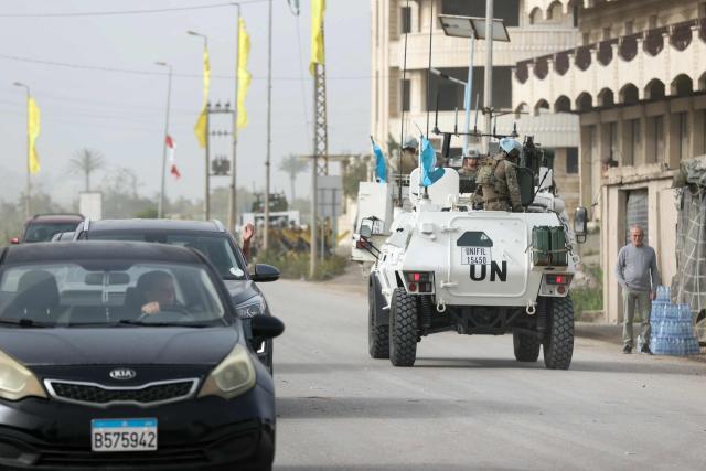 A French contingent of the United Nations Interim Force in Lebanon (UNIFIL) patrols the area as displaced residents make their way back to their homes in the southern Lebanese area of Al-Qasmiyeh on April 18, 2026. Israel and Lebanon agreed to a 10-day ceasefire on April 16 in order to negotiate an end to six weeks of war between Israel and the Iran-backed group Hezbollah. The conflict saw massive Israeli airstrikes across Lebanon and also a ground invasion in the south. (Photo by MAHMOUD ZAYYAT / AFP)