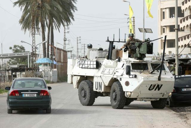 A French contingent of the United Nations Interim Force in Lebanon (UNIFIL) patrols the area as displaced residents make their way back to their homes in the southern Lebanese area of Al-Qasmiyeh on April 18, 2026. Israel and Lebanon agreed to a 10-day ceasefire on April 16 in order to negotiate an end to six weeks of war between Israel and the Iran-backed group Hezbollah. The conflict saw massive Israeli airstrikes across Lebanon and also a ground invasion in the south. (Photo by MAHMOUD ZAYYAT / AFP)
