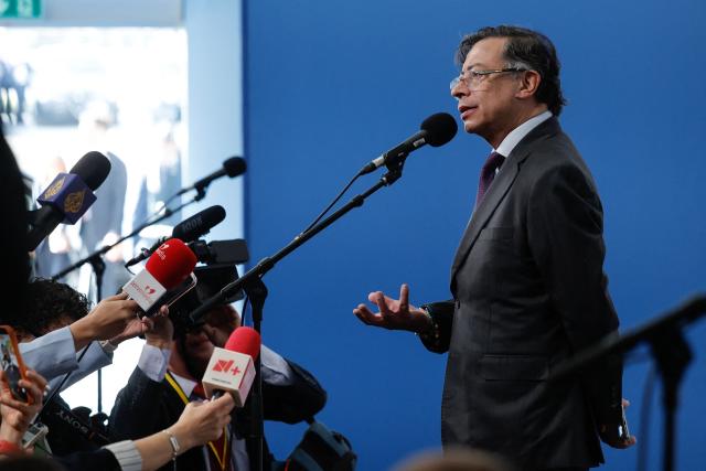President of Colombia Gustavo Petro speaks to reporters as he arrives to attend the "Meeting in Defence of Democracy", a meeting of leftist leaders seeking to rally against the threat to democracy from the far right in Barcelona on April 18, 2026. The gathering comes as democratic institutions and values have faced growing threats around the globe from advancing authoritarian and far-right forces in the age of US President Donald Trump.
Many of the participants will take part in the first edition of the so-called "Global Progressive Mobilisation" which will be held in the same venue. (Photo by Oscar DEL POZO / AFP)