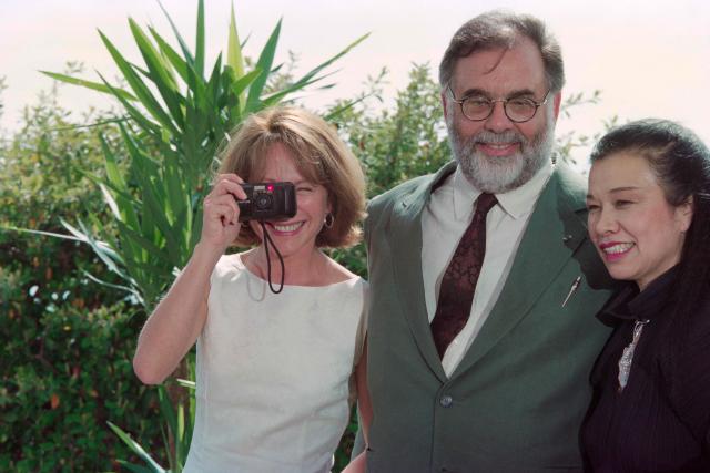 (FILES) Jury chairman of the 49th Cannes Film Festival, Francis Ford Coppola (C), poses with British actress Greta Scacchi (L) and French actress Nathalie Baye, taking a picture, on May 10, 1996 at the Palais des Festivals at Cannes, during the presentation of the jury to the press. Nathalie Baye passed away on April 17, 2026, announced her family to Agence France-Presse on April 18, 2026. (Photo by Patrick HERTZOG / AFP)